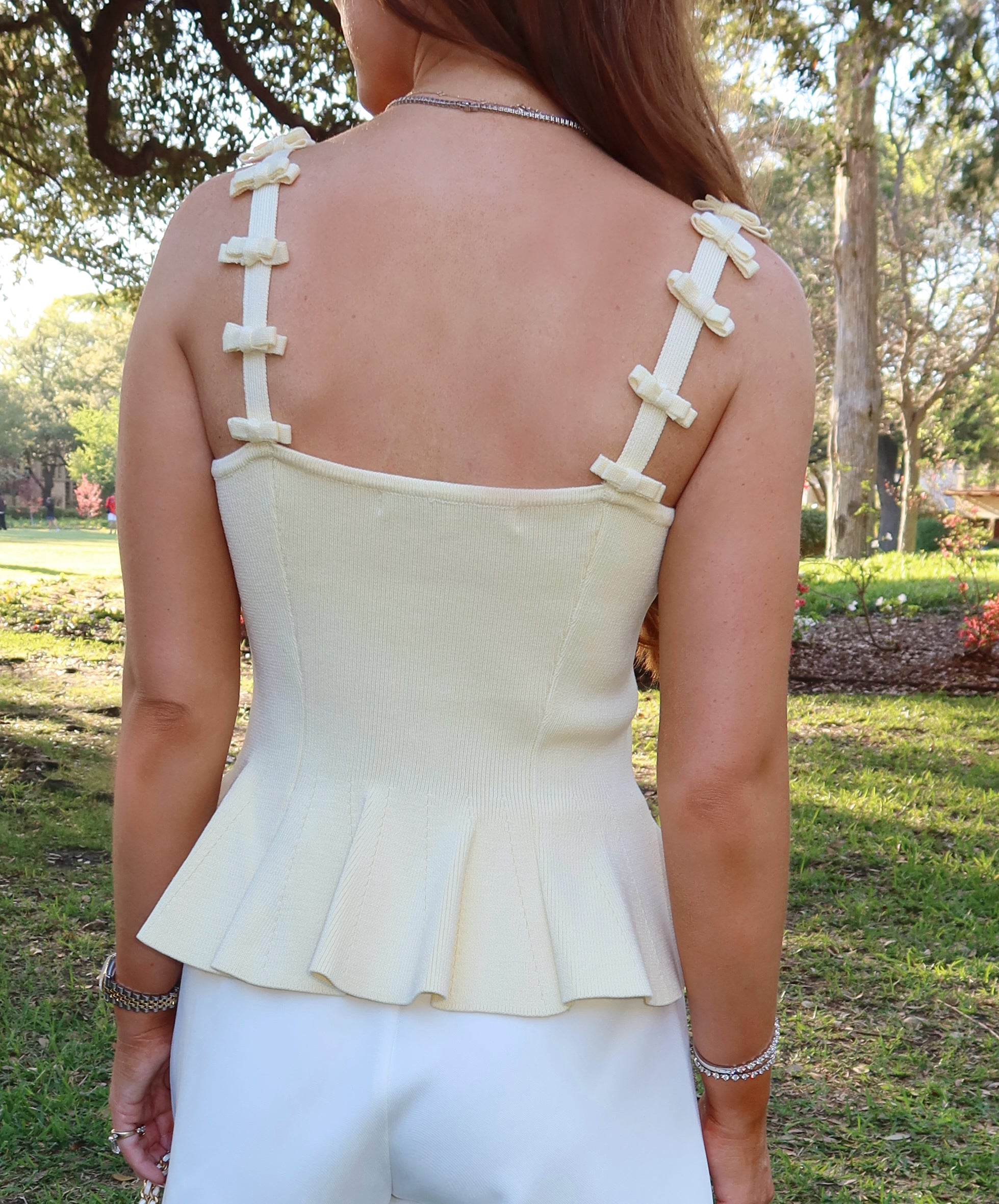 Pia Bow Peplum Top