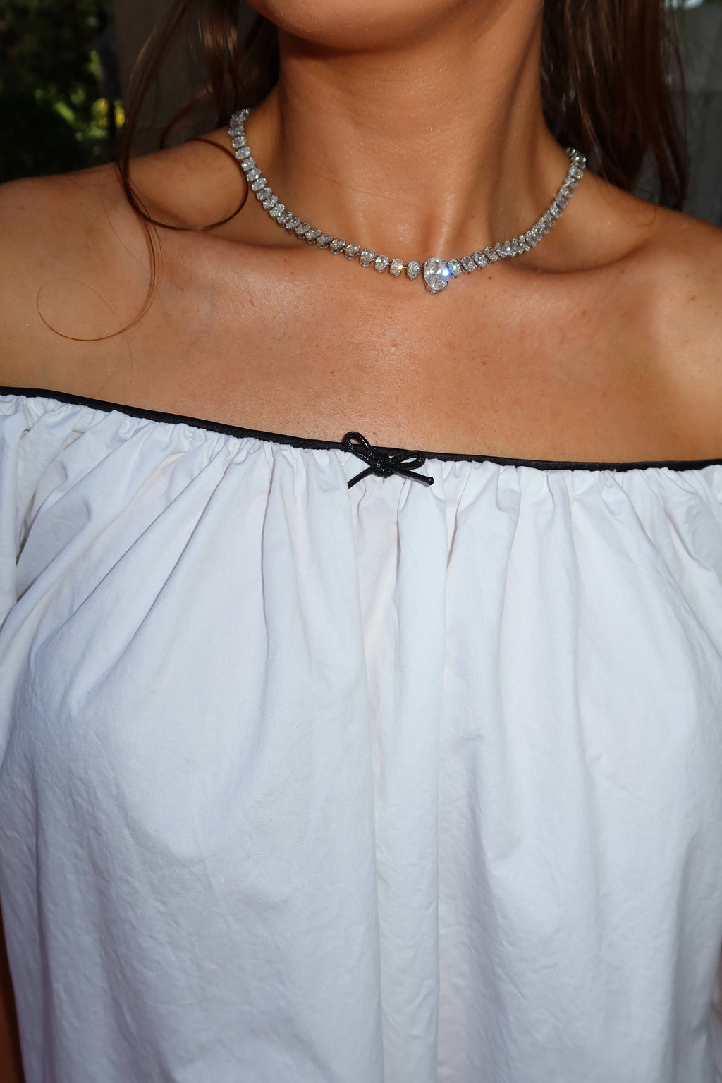 Saylor Mae White Baby Doll Dress with Black Piping + Bow