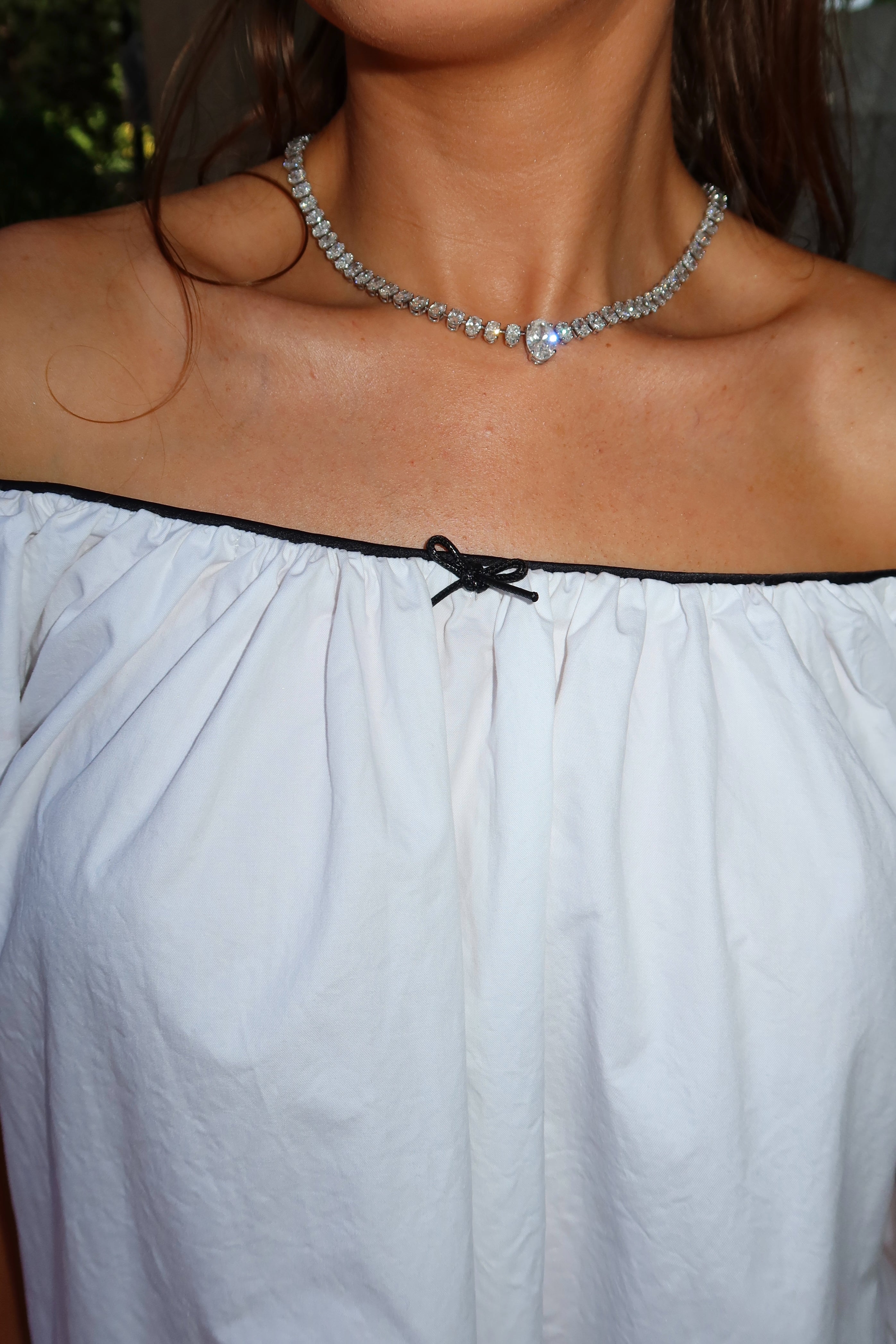 Saylor Mae White Baby Doll Dress with Black Piping + Bow