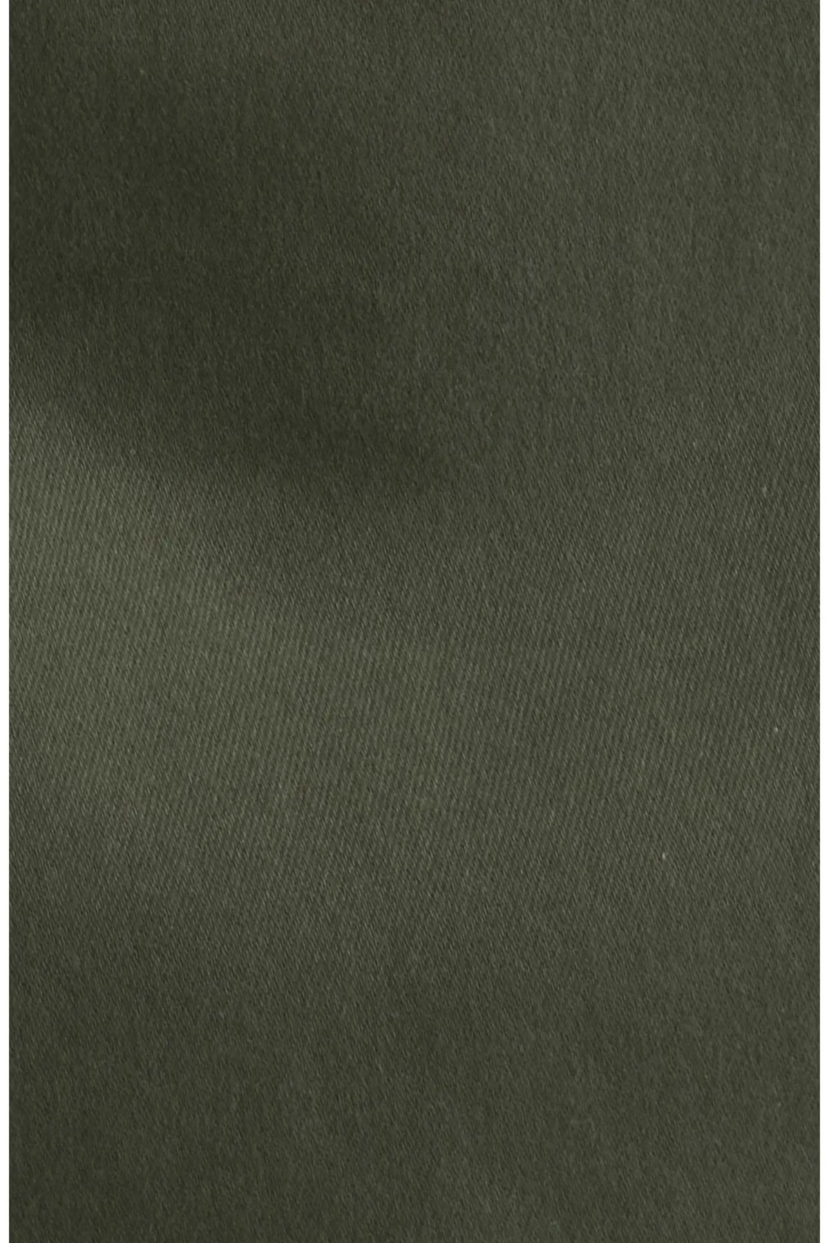 A close-up of a dark olive green textured fabric, showing a fine woven pattern.